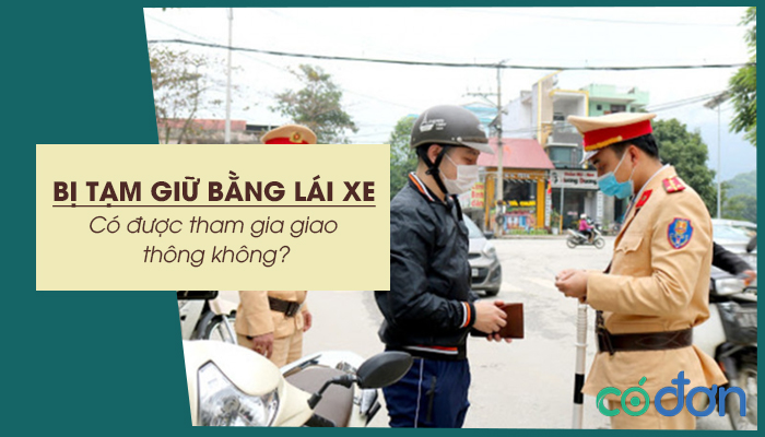 dang bi tam giu bang lai xe co duoc tham gia giao thong khong